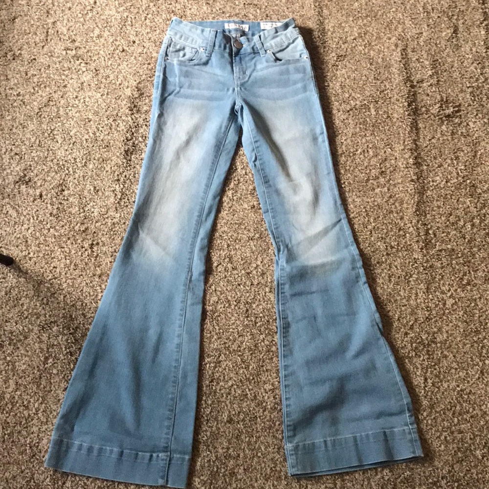 GUESS light wash medium rise flare jeans